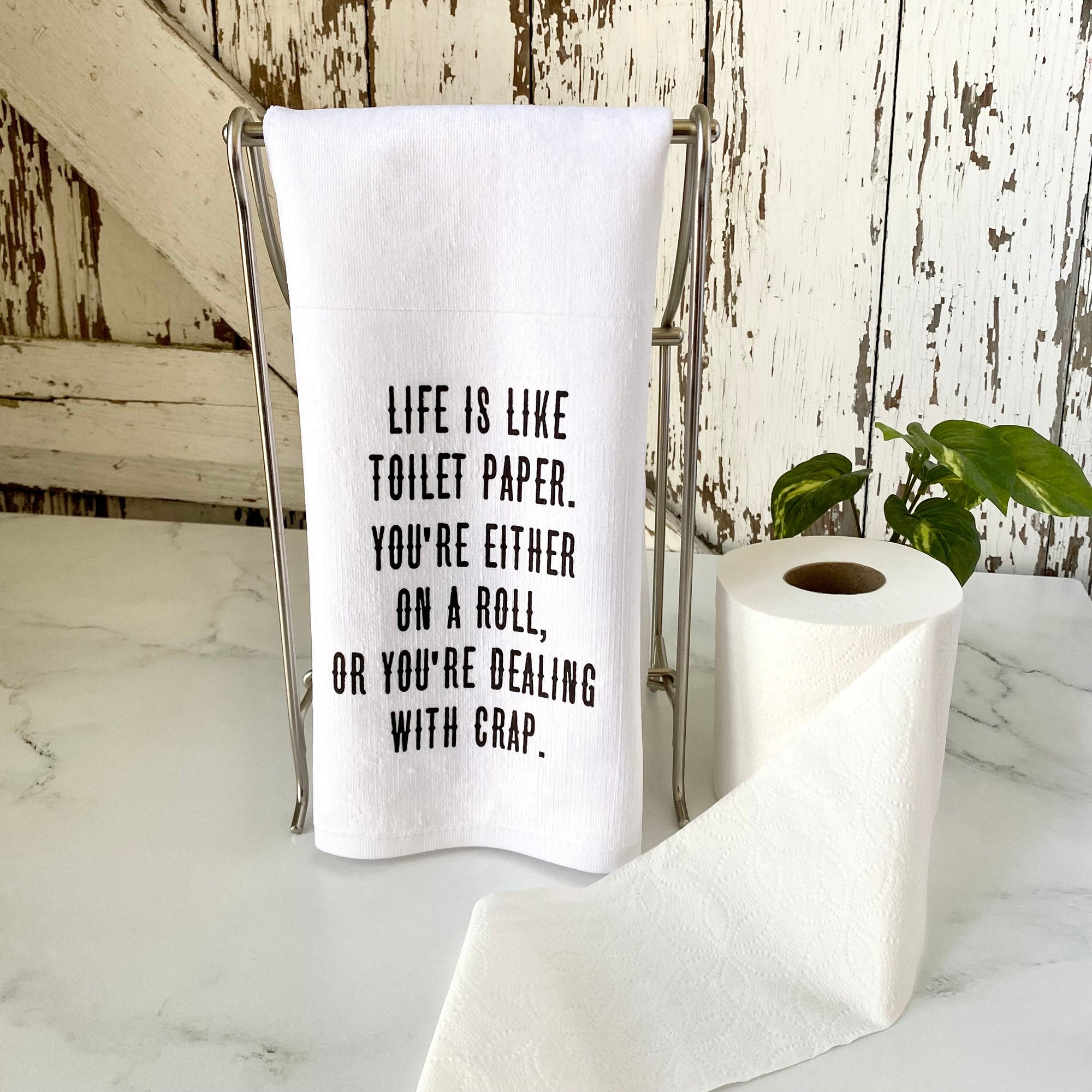 Life is like toilet paper. You’re either on a roll, or you’re dealing with crap.- Funny Handtowel- Bathroom Decor