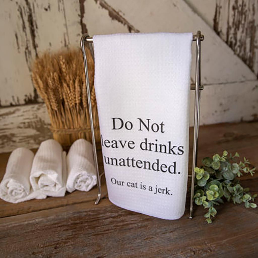 Do Not leave drinks unattended. Our cat is a jerk. Dishtowel