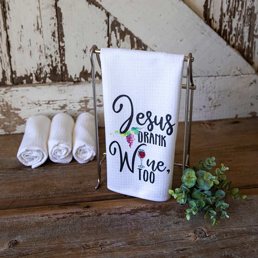 Jesus Drank Wine, Too dish towel with grapes detail and the "I" in wine is a glass of red wine.