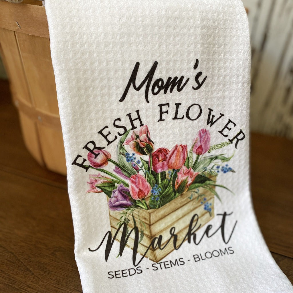 Mom's Fresh Flower Market dish towel with a beautiful box of spring flowers.